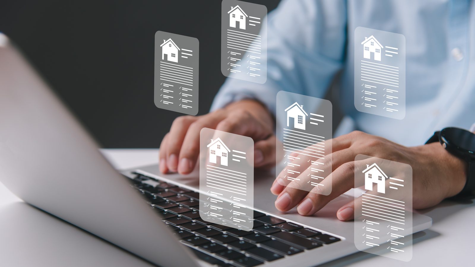 Reviewing property listings on a laptop